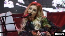 Russia selected singer Yulia Samoilova as its contestant in this year's Eurovision contest, but Ukraine barred her from coming to Kyiv because she violated national law by performing in Crimea. (file photo)