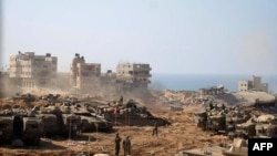 Газа тилкесиндеги жөөт армиясынын танктары жана аскерлери. 5-ноябрь, 2023-жыл.

