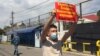 Serik Azhibai demonstrates outside the Chinese Consulate in Almaty on August 3.