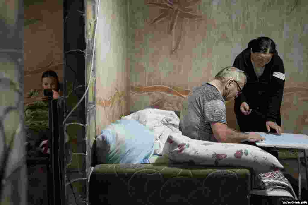 A man casts his vote at a mobile ballot box in the village of Hrusevo, Moldova, during a presidential election and EU referendum on October 20.