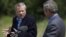 De Hoop Scheffer (left) and Bush on May 21