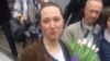 Darya Kulakova is greeted by supporters on May 9.