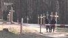 Activists Detained In Belarus While Protesting Removal Of Crosses From Stalin Victims Memorial