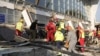 Emergency and rescue personnel work at the site where a concrete outdoor roof of a train station collapsed in the northern Serbian city of Novi Sad on November 1, 2024. 