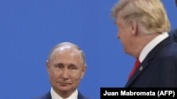 Владимир Путин жана Дональд Трамп.