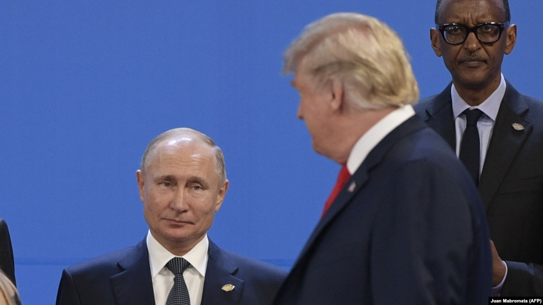Vladimir Putin i Donald Tramp, uoči fotografisanja zajedničke slike učesnika samita G20 u Argentini