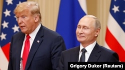 ABŞ-nyň prezidenti Donald Tramp we Orsýetiň prezidenti Wladimir Putin. 16-njy iýul, 2018 ý. Helsinki