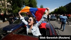 ARMENIA -- A woman reacts during a rally held by supporters of Armenian opposition leader Nikol Pashinian in Yerevan, April 25, 2018