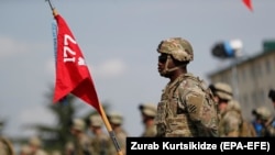 U.S. servicemen take part in the opening ceremony of the Noble Partner 2020 exercises at a base outside Tbilisi.