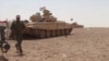 Iraqi Tank Unit Clears Mines On Road To Mosul