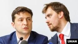 Ukrainian President Volodymyr Zelenskiy (left) and the deputy chairman of the Office of the President, Oleksiy Honcharuk, who is believed to be the top pick for prime minister.