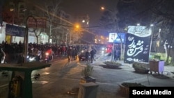 Protesters take to the streets on January 10 in Tehran's Pasdaran district, a relatively affluent neighborhood in the Iranian capital.