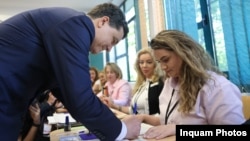Bucharest Mayor Nicusor Dan, shown casting his vote on May 4, is one of 11 candidates competing in the election.
