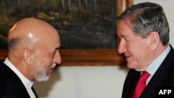 Do Afghan President Hamid Karzai (left) and U.S. special envoy Richard Holbrooke see eye-to-eye on which insurgents can be talked to?