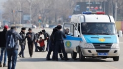 Kazakh police officers detain opposition protesters during a rally in Almaty. As is the case across much of Central Asia, space for genuine political competition has steadily narrowed in Kazakhstan in recent years.