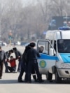 Kazakh police officers detain opposition protesters during a rally in Almaty. As is the case across much of Central Asia, space for genuine political competition has steadily narrowed in Kazakhstan in recent years.