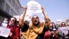 Afghan women's rights defenders and civil activists protest to call on the Taliban for the preservation of their achievements and education, in front of the presidential palace in Kabul, Afghanistan September 3, 2021.