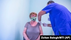 A woman receives the Russian Sputnik V vaccine at the South Pest Central Hospital in Budapest on February 12.