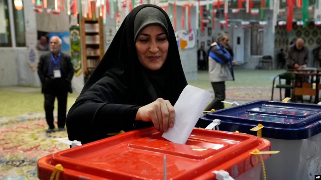 A woman in Tehran casts her ballot on March 1. 
