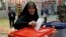 A woman in Tehran casts her ballot on March 1. 