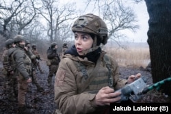 Kupo operates a drone at the training ground.