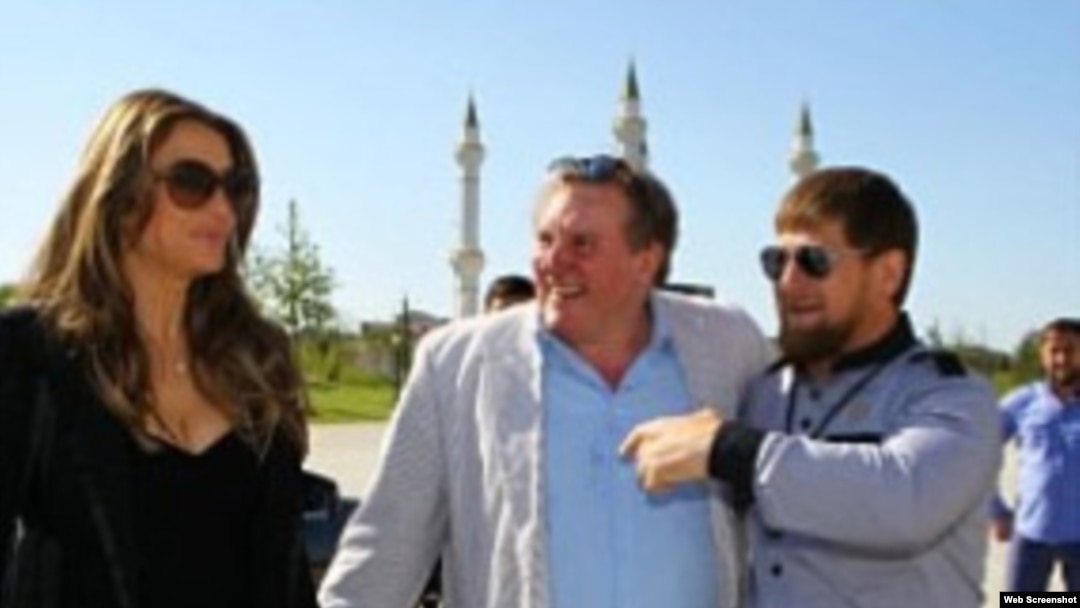 A screenshot from Ramzan Kadyrov's Instagram account shows actors Elizabeth Hurley (left) and Gerard Depardieu (center) fraternizing with the Chechen leader in Grozny.