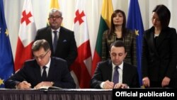 ალგირდას ბუტკევიჩიუსი და ირაკლი ღარიბაშვილი