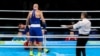 Василий Левит (в синем) и Евгений Тищенко на ринге во время финального боя в Рио среди боксеров-тяжеловесов. 15 августа 2016 года.