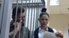 Обвиняемый по "московскому делу" Кирилл Жуков со своим адвокатом на заседании суда