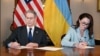 US Treasury Secretary Scott Bessant and Ukraine's First Deputy Prime Minister Yulia Svyrydenko sign minerals agreement. 