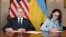 US Treasury Secretary Scott Bessant and Ukraine's First Deputy Prime Minister Yulia Svyrydenko sign minerals agreement. 