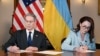 US Treasury Secretary Scott Bessant and Ukraine's First Deputy Prime Minister Yulia Svyrydenko sign the minerals agreement