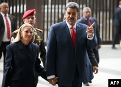 ნიკოლას მადურო და მისი ცოლი სილია ფლორესი. 2 აგვისტო, 2024 წ.