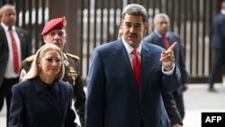 Президент Венесуэлы Николас Мадурои его жена Силия Флорес. Каракас, 2 августа 2024 года. Архивное фото