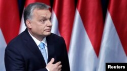 Hungary - Hungarian Prime Minister Viktor Orban leaves the stage after delivering his annual state of the nation speech in Budapest, Hungary, February 10, 2019. REUTERS/Bernadett Szabo