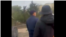 Жаңжалдын видеосунан алынган сүрөт.
