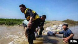 Iran -- Heavy rains have battered Iran's northern provinces of Golestan and Mazandaran, leaving homes flooded and others without power.