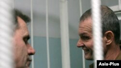 Tajikistan -- the trial of Sadovnichiy (right) and Rudenko (left), Russian pilots detained in Qurghonteppa, Khatlon region, 22Nov2011