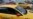 An Uber car (back) and a Yandex.Taxi car on the streets of Moscow in July.
