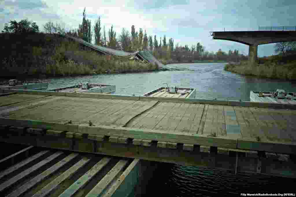 With so many damaged roads and bridges in eastern Ukraine, it can be a challenge for World Food Program workers to deliver humanitarian aid. 