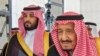 A handout picture provided by the Saudi Royal Palace on November 20, 2019 shows Saudi Arabia's King Salman bin Abdulaziz (R) with Crown Prince Mohammed bin Salman, in the capital Riyadh. 