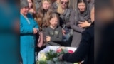 Mourners Honor Ukrainian Mother Killed While Protecting Her Child
GRAB