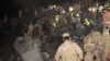 Pakistani soldiers search for victims from the wreckage of the crashed PIA passenger plane Flight PK661 at the site in the village of Saddha Batolni in the Abbottabad district of Khyber Pakhtunkhwa province on December 7.