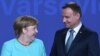Канцлерка Німеччини Ангела Меркель та президент Польщі Анджей Дуда під час саміту НАТО у Варшаві, 2016 рік
