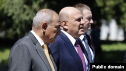 Kyrgyzstan - Prime Ministers Mikhail Mishustin (center) of Russia and Nikol Pashinian of Armenia attend an EEU meeting in Cholpon-Ata, August 7, 2026.