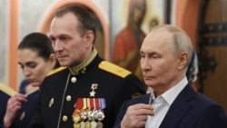 Russian President Vladimir Putin (right) has had few public appearances since the New Year -- and made no public statements about the upheaval in Iran and Venezuela. 