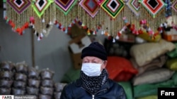 Shop in Qom selling decorative pendants made with peganum harmala seedpods to avert evil eye and ward off disease. February 27, 2020.