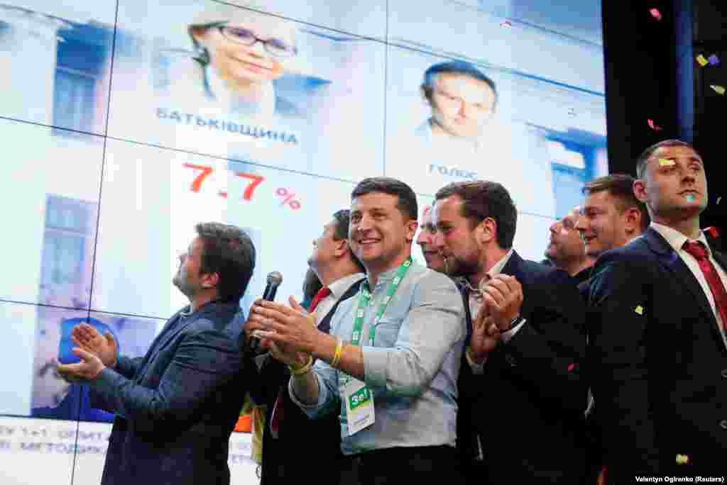 Ukrainian President Volodymyr Zelenskiy reacts at his party's headquarters in Kyiv as exit poll results are announced on July 21, 2019. (Reuters/Valentyn Ogirenko)