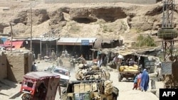 British soldiers with the NATO-led International Security Assistance Force (ISAF) in the town of Girishk in Helmand Province