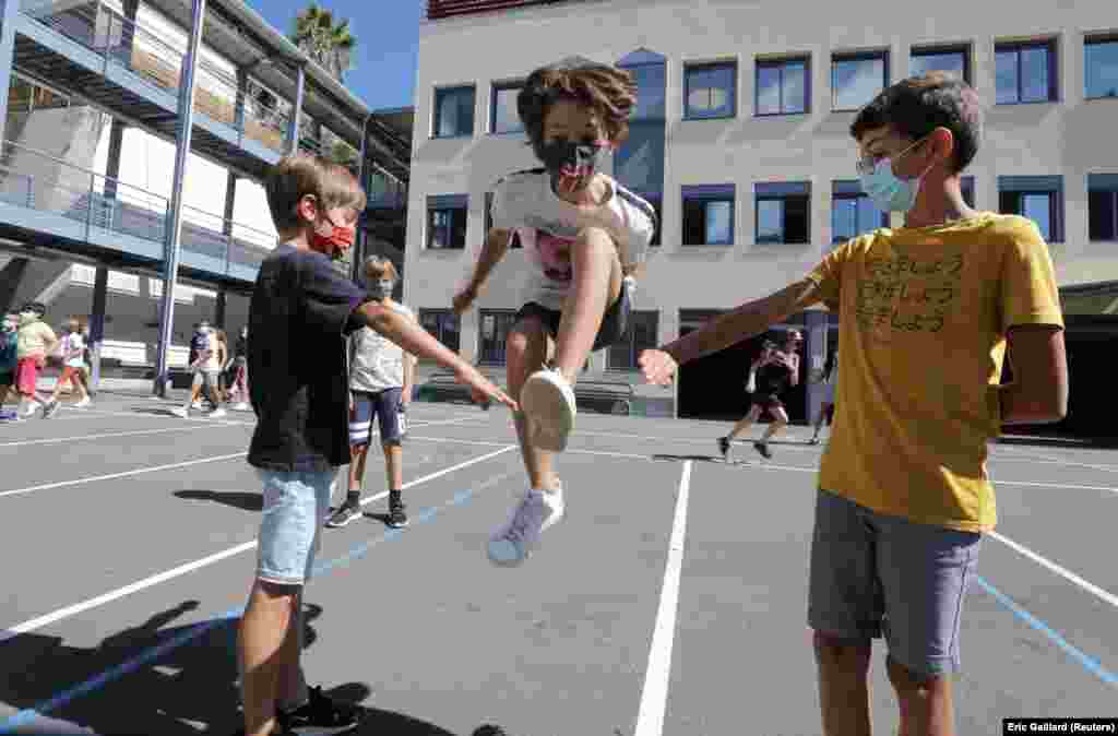 Secondary schoolchildren at Henri Matisse College in Nice, France. French teachers and pupils between 11 and 18 years old are required to wear face masks both indoors and outside.